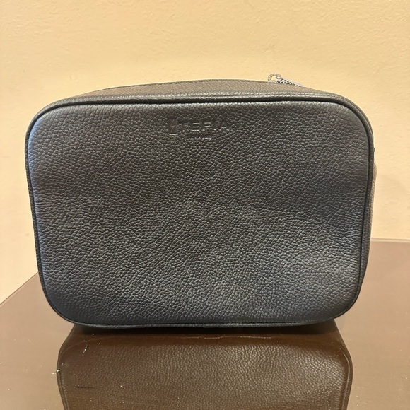 Tumi Handbags - Black new Purce (no handle) Pebbled Leather Finish